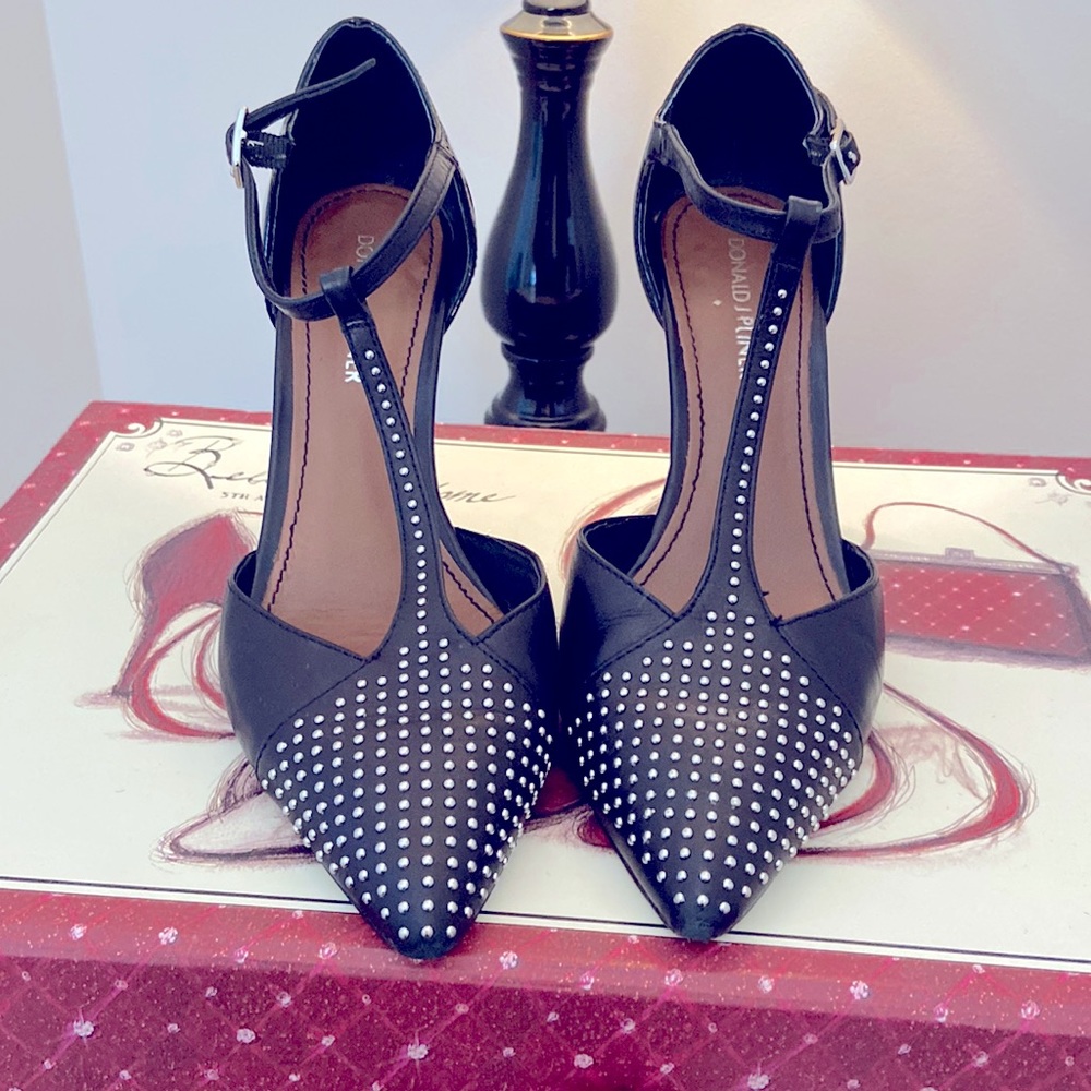 Size 7M Donald J Pliner T-Strap heels with silver stud details.
